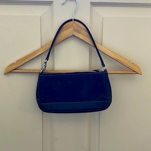 Under the arm small black leather coach purse